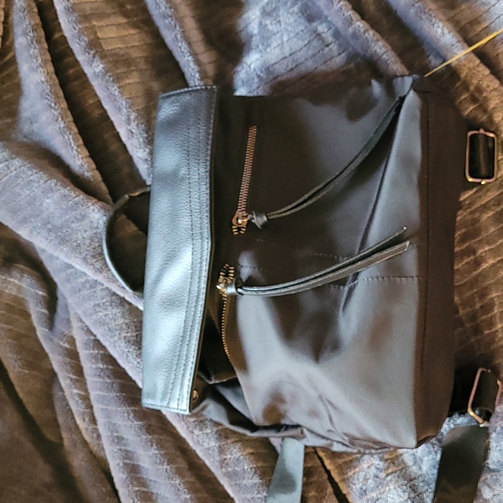 Botkier black canvas backpack 11"x8", adjustable straps